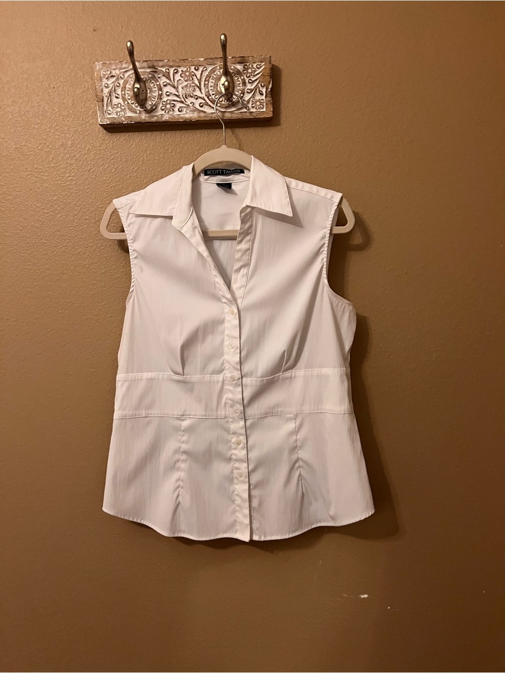 Sleeveless White Button-Down Shirt